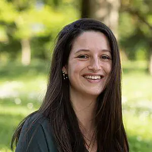 Smiling woman outdoors in park